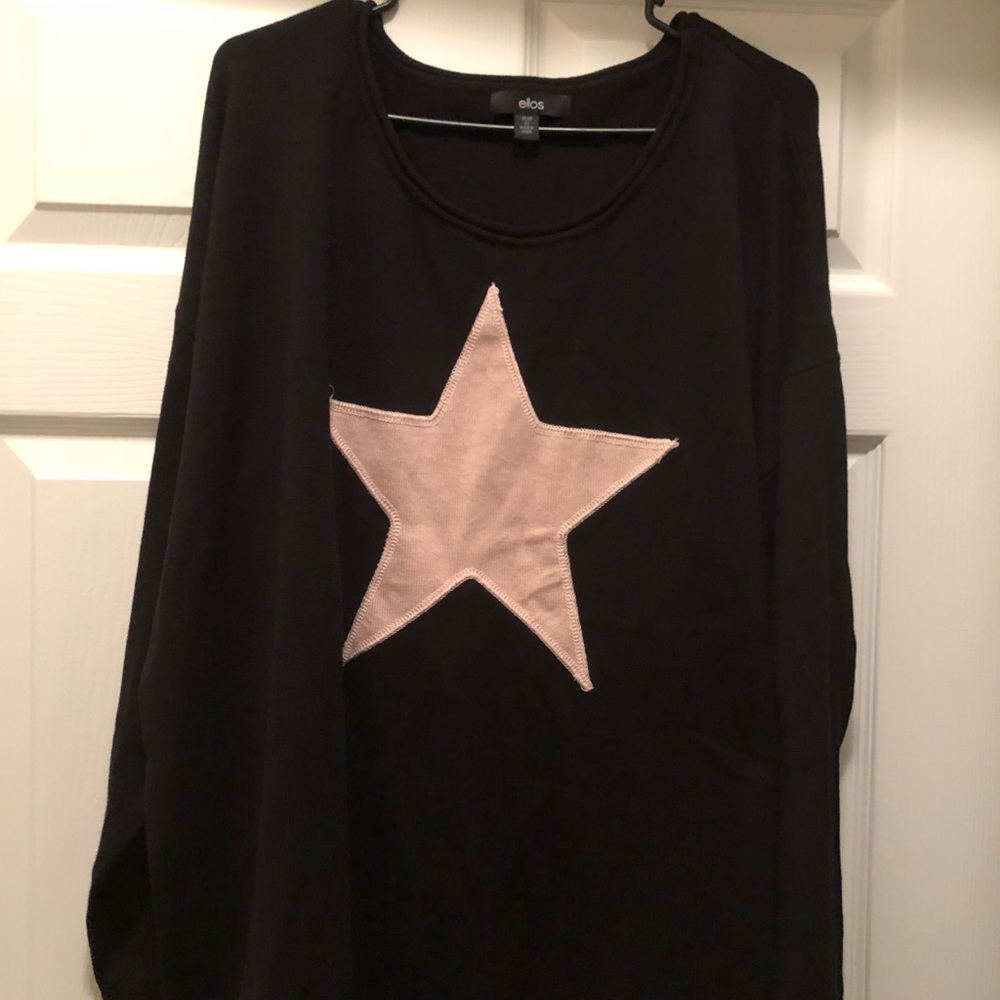 Black sweater with a pink star. Never Worn.      103
